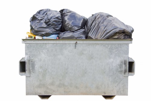 Professional waste collectors from a Fitzrovia recycling service.