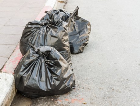 Front view of a skip on a residential street