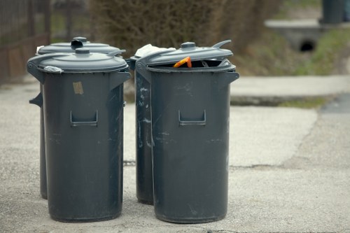 Skip container placed on a residential driveway in Fitzrovia